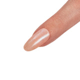 Seche FX Diamond Effect Top Coat Blue applied on top of nude nail color