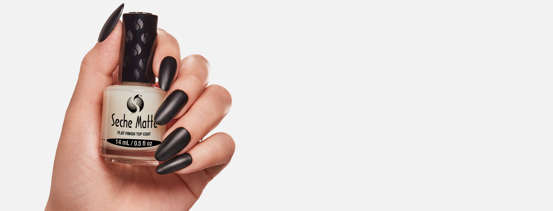 Hand holding Seche lacquer